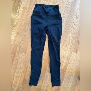 Lululemon black leggings with mesh siding, size 4